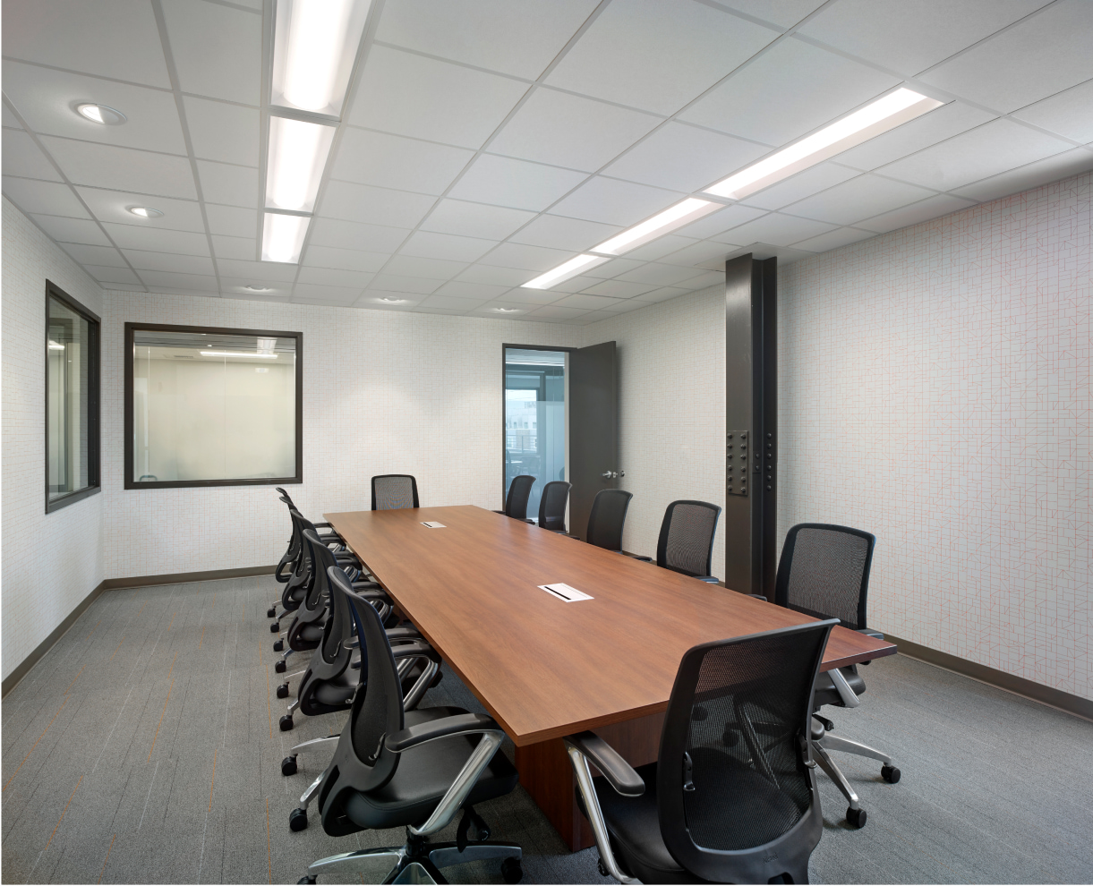 Mazzoni center conference room with a desk and chairs