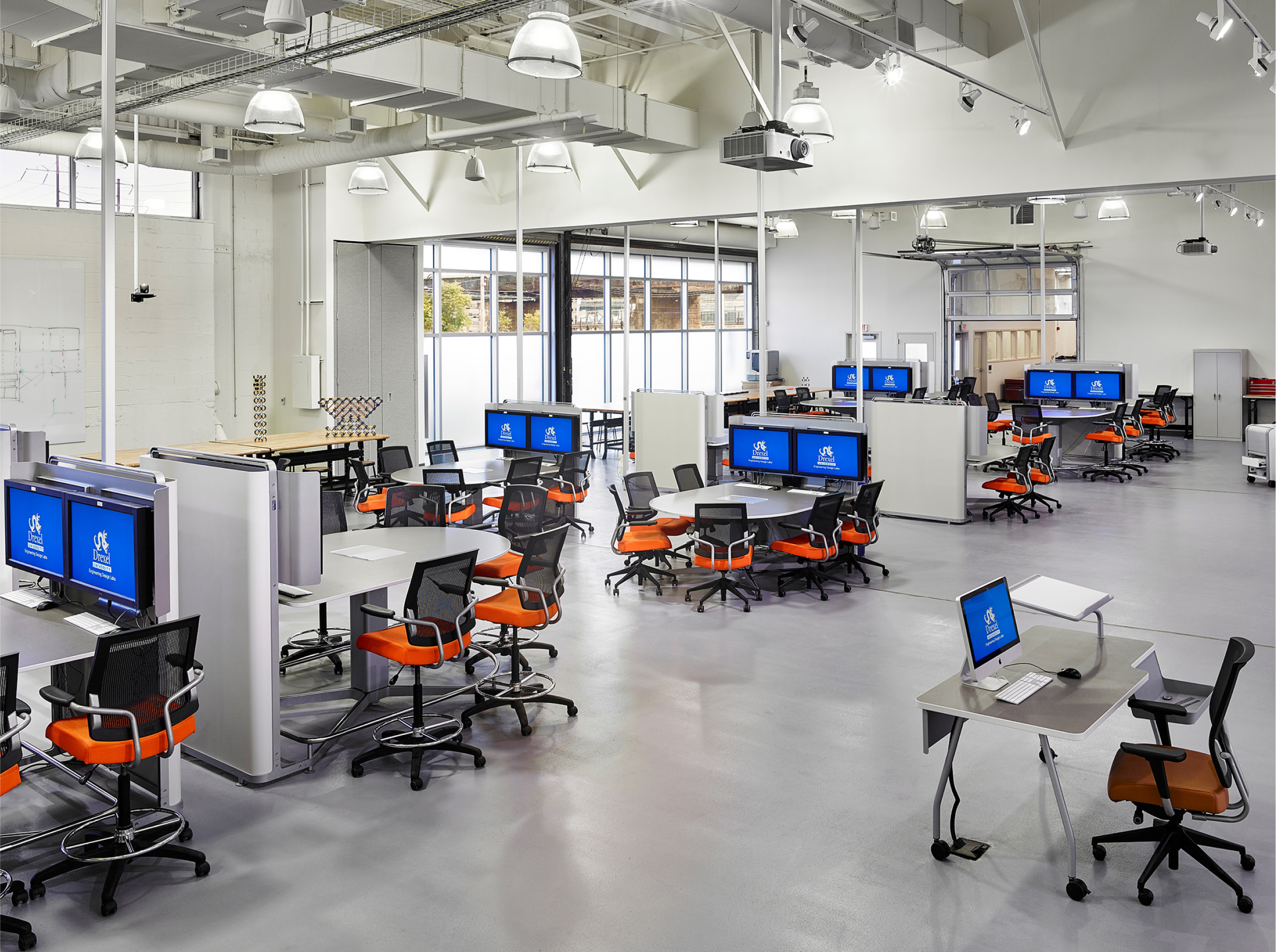 Broad office space with a lot of desks/chairs
