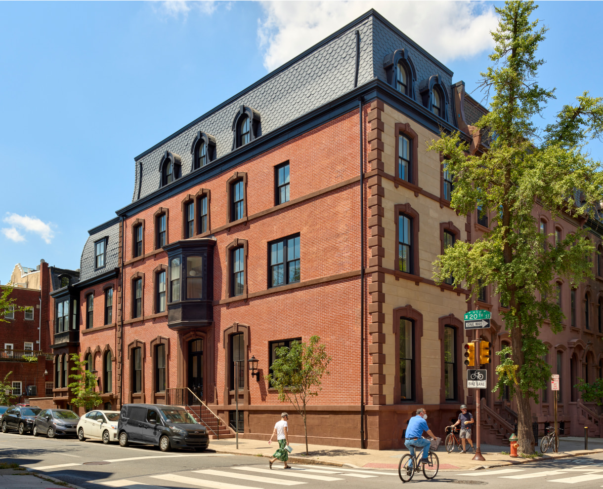2000 Spruce Street exterior view with people moving around
