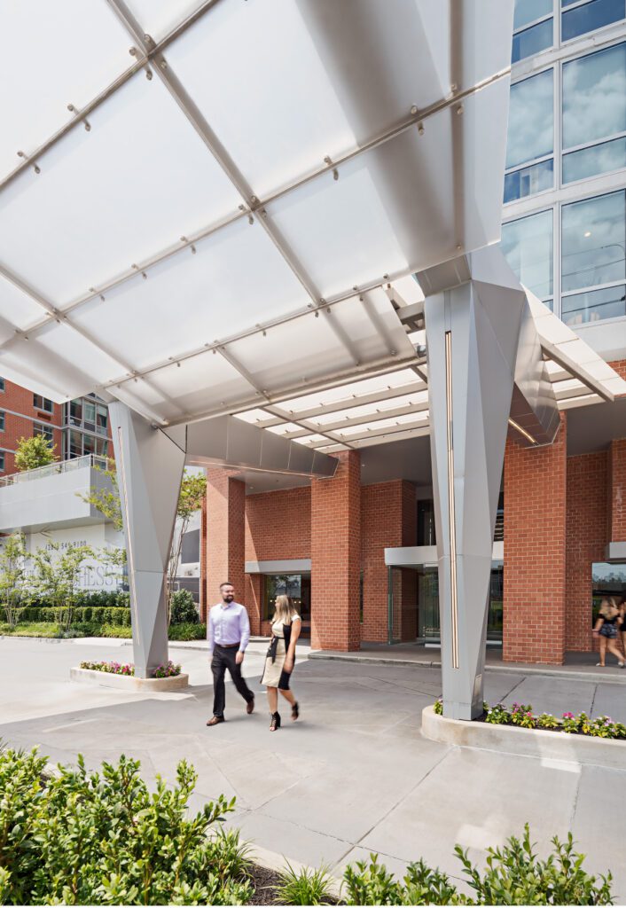 Entrance of The Duchess Canopy with two people coming out