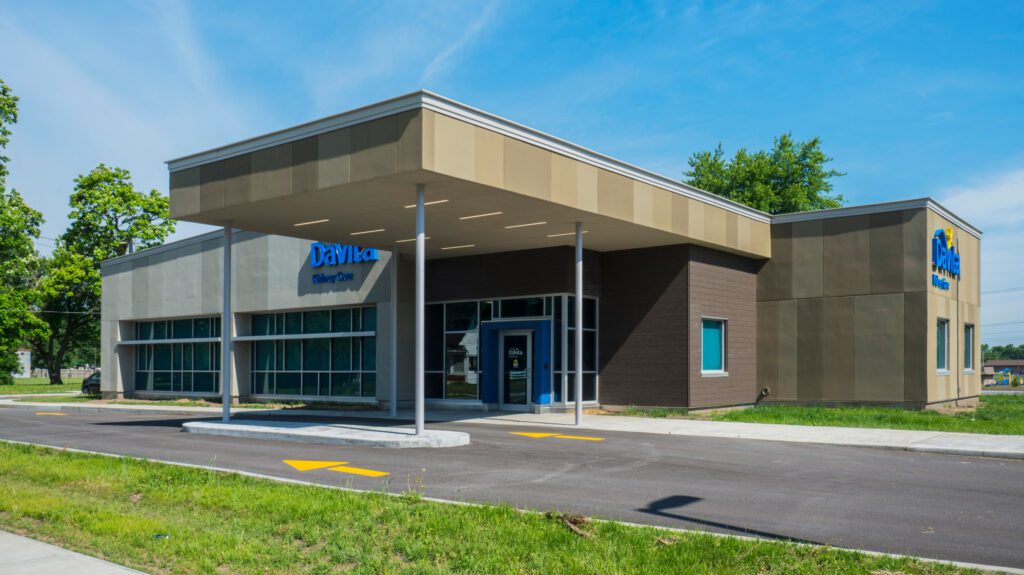 Dialysis Clinics entrance with a big sign on the building